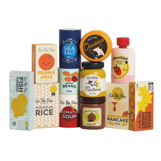 Assorted food packaging on a beige background